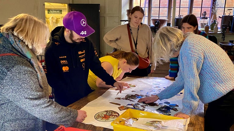 Community workshop inspired by conservation of stained glass window at the Elizabethan House